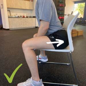proper way to stand up with bottom in the back of the chair