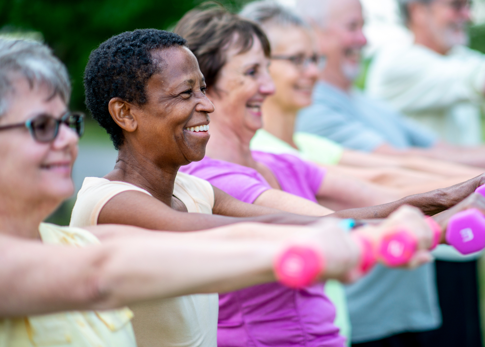 woman lifting weights strength training for women